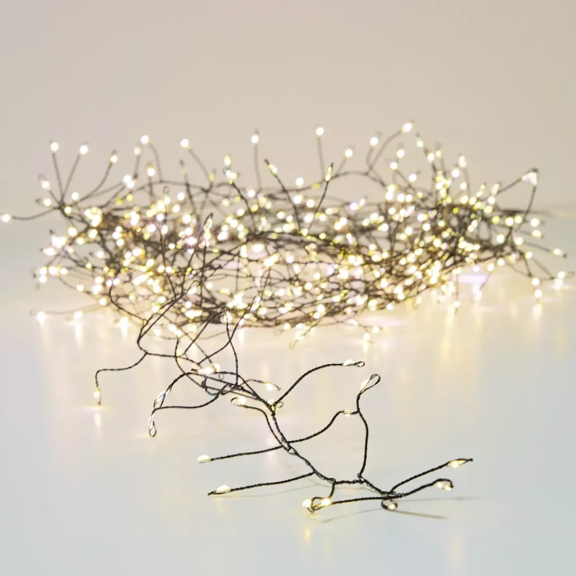 Ghirlanda luminosa 12 m 960 Micro LED cavo nero Luxe Bianco caldo