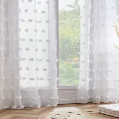 Tenda trasparente con occhielli pon pon (140 x 280 cm) Suzie Bianco