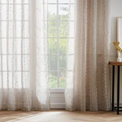 Tenda trasparente con occhielli con pon pon (180 x 240 cm) Axel Beige