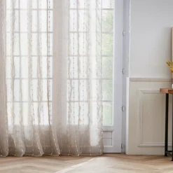 Tenda trasparente con passanti nascosti e pon pon (280 x 240 cm) Axel Beige